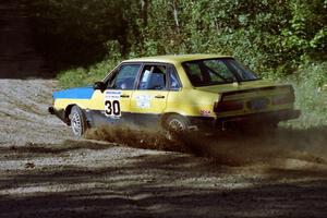 Mike Bodnar / Steve Bodnar Audi 4000 Quattro at the spectator point on SS10 (Kabekona).