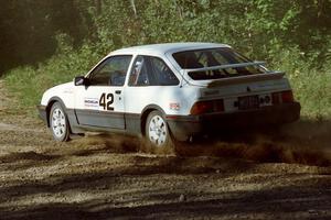Colin McCleery / Jeff Secor Merkur XR4Ti at the spectator point on SS10 (Kabekona).