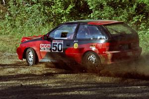 Kurt Winkelmann / Tom Sherony Suzuki Swift at the spectator point on SS10 (Kabekona).