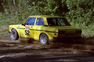 Alex Timmermans / John Golden Datsun 510 at the spectator point on SS10 (Kabekona).