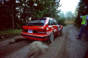 Gail Truess / Pattie Hughes Mazda 323GTX launches from the start of SS13 (Thorpe Tower).