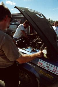 Todd Erickson and Doug Dill work on the Mark Utecht / Doug Dill Dodge Omni GLH-Turbo at Park Rapids service.
