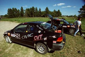 The Jay Kowalik / Scott Embree Honda Civic CVT and Bryan Hourt / Pete Cardimen Honda Civic at service.