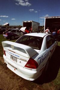 The David Summerbell / Mike Fennell Mitubishi Lancer Evo IV at service.