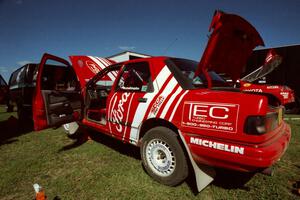 Mike Whitman / Paula Gibeault Ford Sierra Cosworth gets serviced at the West Forty in Park Rapids on day two.