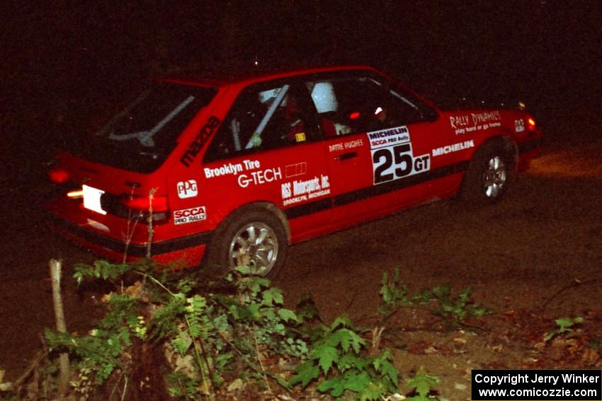 Gail Truess / Pattie Hughes Mazda 323GTX on a stage during the first night.