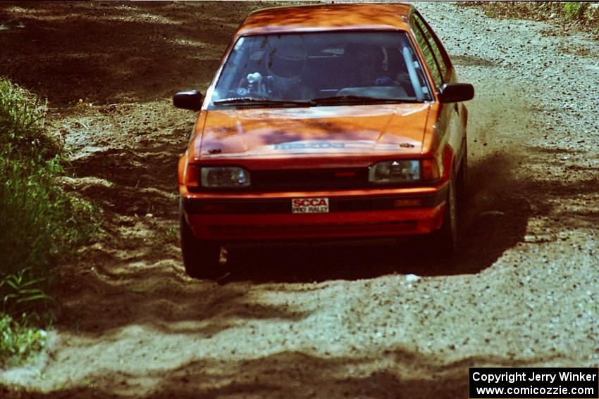 Gail Truess / Pattie Hughes Mazda 323GTX near the start of SS8 (Thorpe Tower).