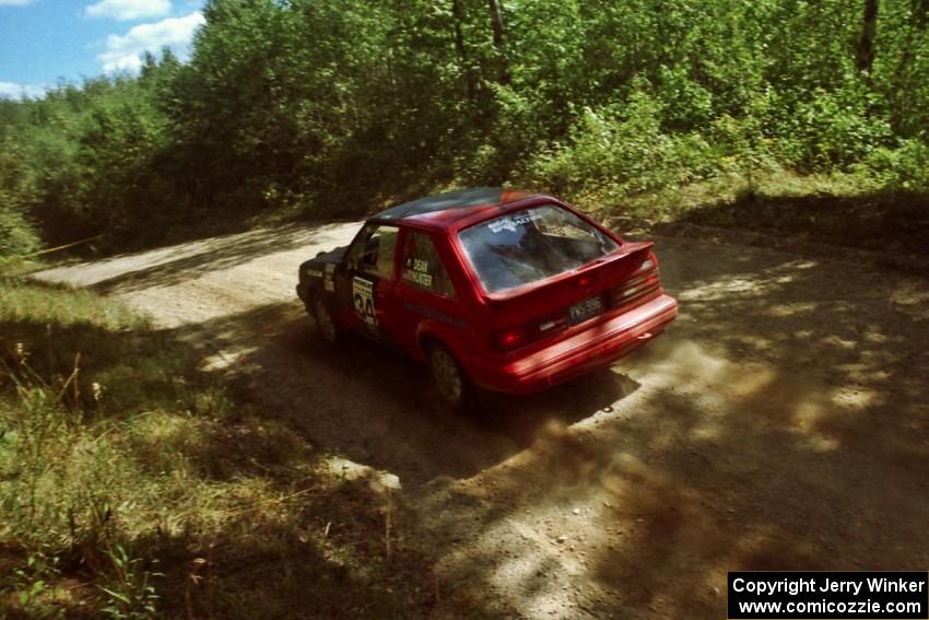 Rod Dean / Nichole Hunter Ford Escort GT near the start of SS8 (Thorpe Tower).