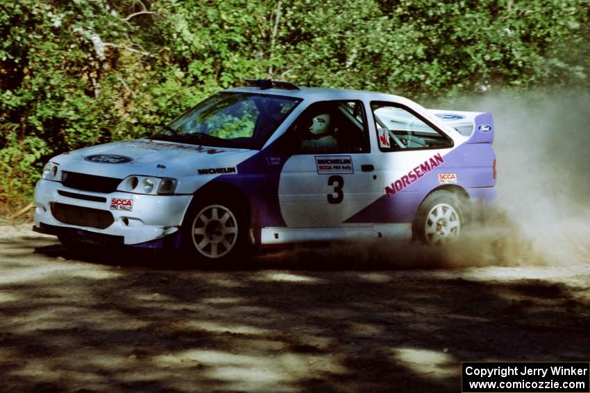 Carl Merrill / Lance Smith Ford Escort Cosworth RS at the spectator point on SS10 (Kabekona).