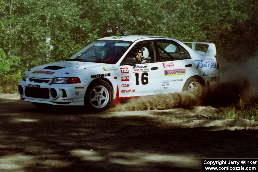 David Summerbell / Mike Fennell Mitubishi Lancer Evo IV at the spectator point on SS10 (Kabekona).