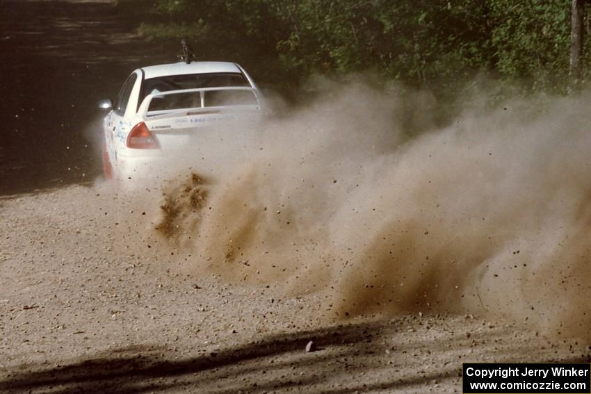 David Summerbell / Mike Fennell Mitubishi Lancer Evo IV at the spectator point on SS10 (Kabekona).