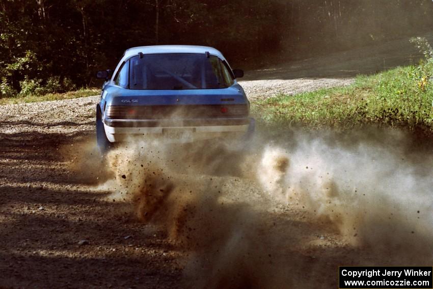 Mike Hurst / Rob Bohn Mazda RX-7 at the spectator point on SS10 (Kabekona).