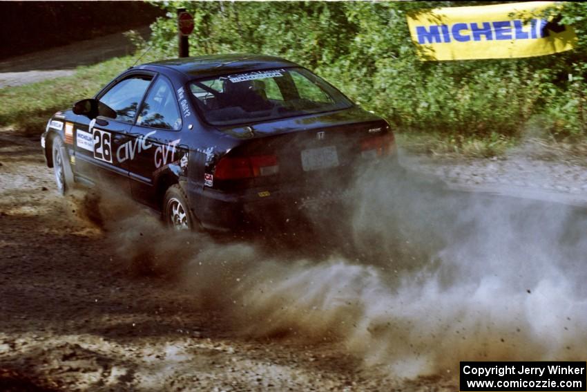 Jay Kowalik / Scott Embree Honda Civic CVT at the spectator point on SS10 (Kabekona).