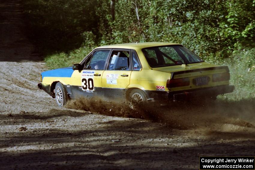 Mike Bodnar / Steve Bodnar Audi 4000 Quattro at the spectator point on SS10 (Kabekona).