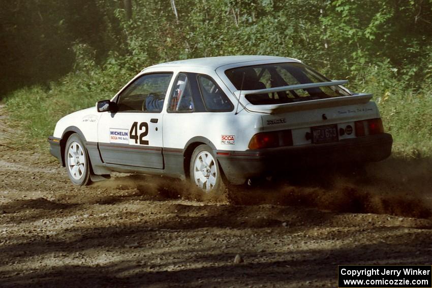 Colin McCleery / Jeff Secor Merkur XR4Ti at the spectator point on SS10 (Kabekona).
