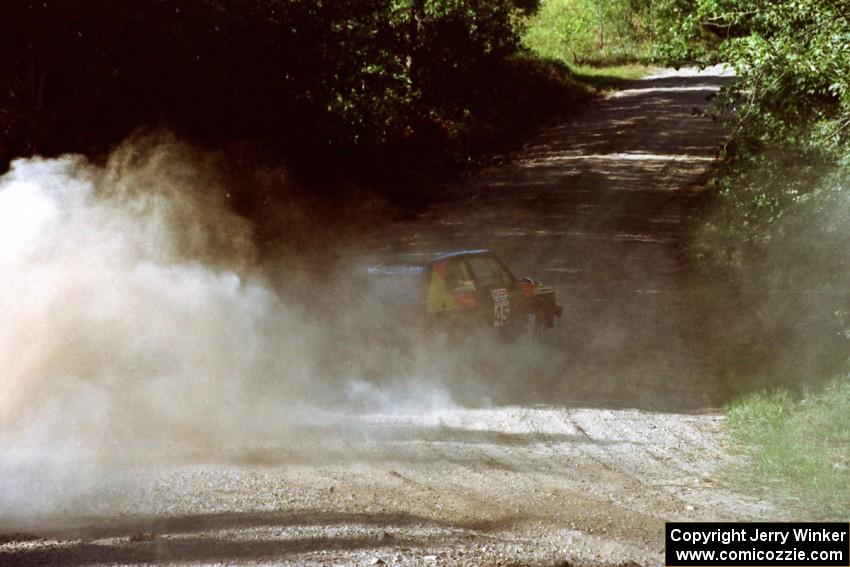 Jason Lajon / John Adleman VW GTI at the spectator point on SS10 (Kabekona).