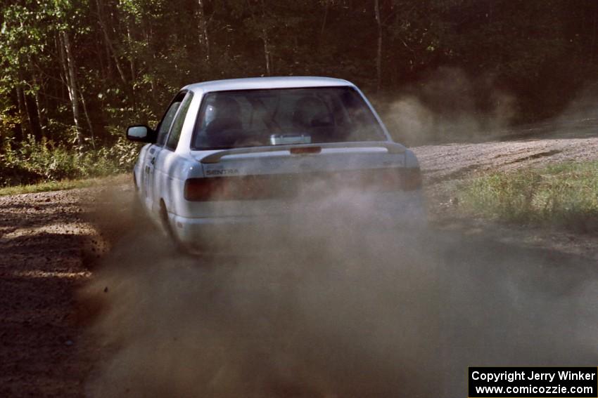 Roland McIvor / Brendan Bohan Nissan Sentra SE-R at the spectator point on SS10 (Kabekona).