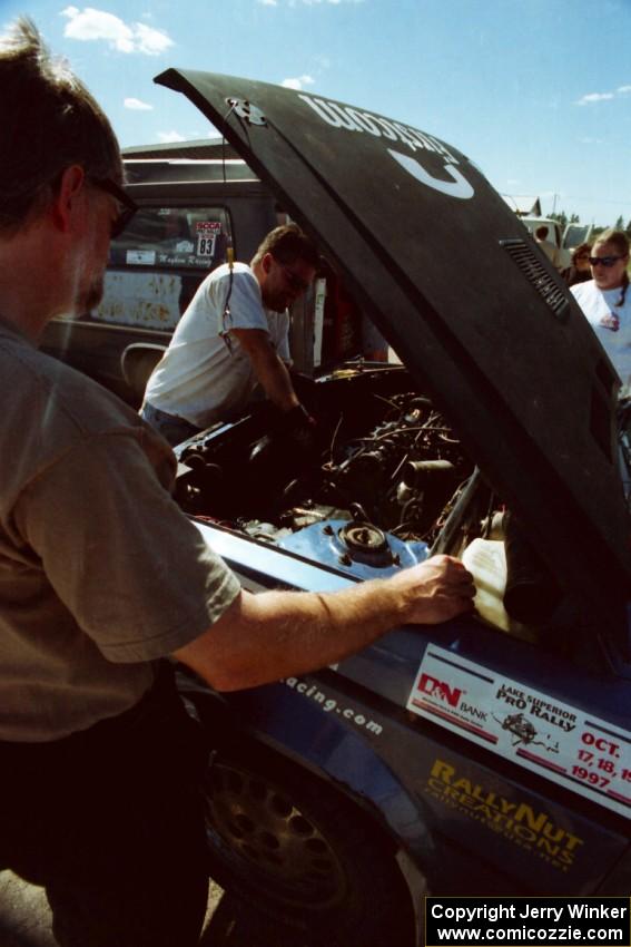 Todd Erickson and Doug Dill work on the Mark Utecht / Doug Dill Dodge Omni GLH-Turbo at Park Rapids service.