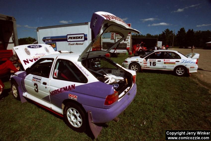 The Carl Merrill / Lance Smith Ford Escort Cosworth RS and David Summerbell / Mike Fennell Mitubishi Lancer Evo IV at service.