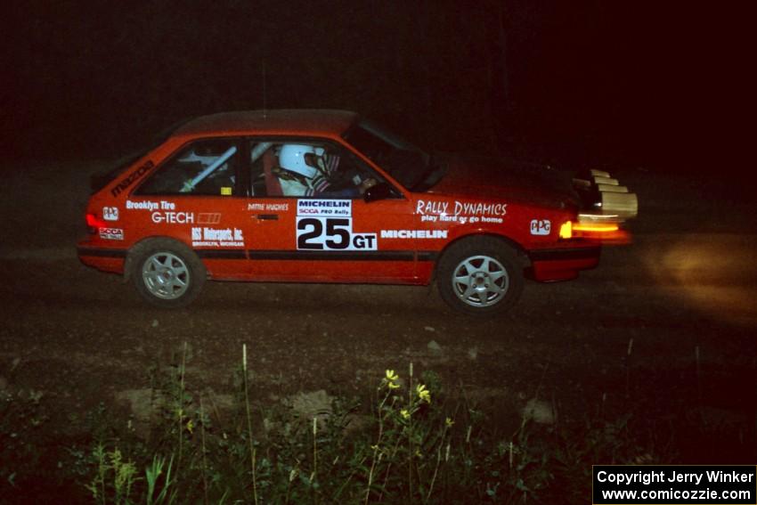 Gail Truess / Pattie Hughes Mazda 323GTX at the spectator point on SS16 (East Steamboat).