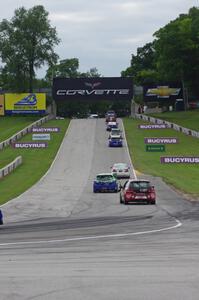 The field heads uphill from turn 5 on the pace lap.