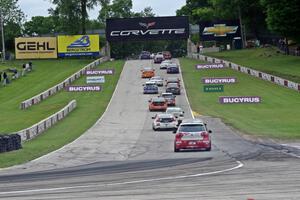 The ST field heads uphill from turn 5 on the first lap.