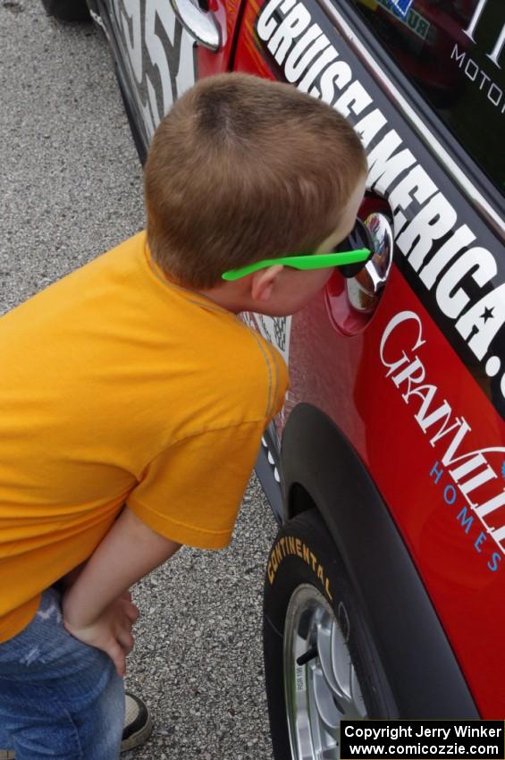 Checking out a reflection on the gas cap of the Dicky Riegel / Ken Schrader Mini Cooper S