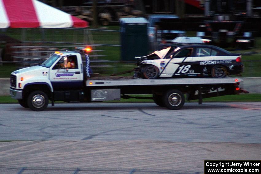 Tyler McQuarrie / Nico Rodet BMW 328i on the tilt-bed after the race