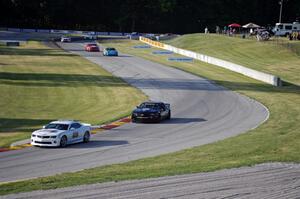 The pace car comes out and slows the field down.