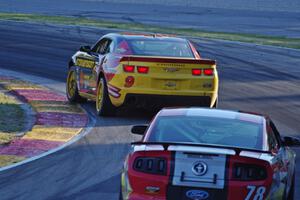 Matt Bell / John Edwards Chevy Camaro GS.R and Rod Randall / Todd Snyder Mustang Boss 302R GT