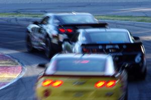 Three Chevy Camaro GS.Rs through turn 6