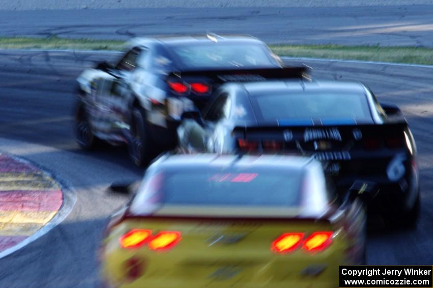 Three Chevy Camaro GS.Rs through turn 6