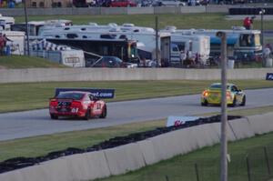 Nick Longhi / Matt Plumb Porsche 997 leads Billy Johnson / Jack Roush, Jr. Mustang Boss 302R GT