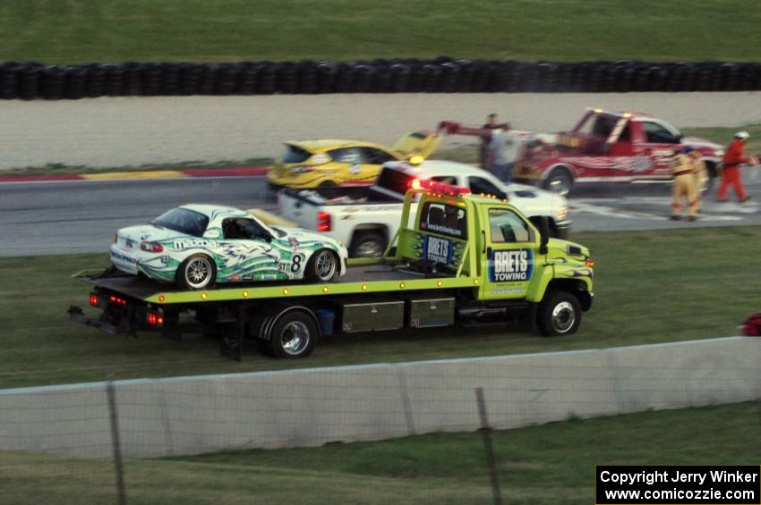 Tyler Cooke / Brad Rampelberg Mazda MX-5 passes the