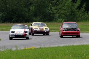 L to R) Team Polska Kielbasa Nissan 280ZX, Gopher Broke Racing Nissan 300ZX and NNM Motorsports Dodge Neon