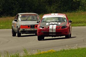 Cheap Escort Ford Escort ZX2 and North Loop Motorsports 2 BMW 325