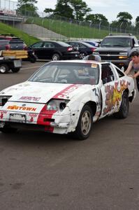 Team Polska Kielbasa Nissan 280ZX in the paddock mid-race