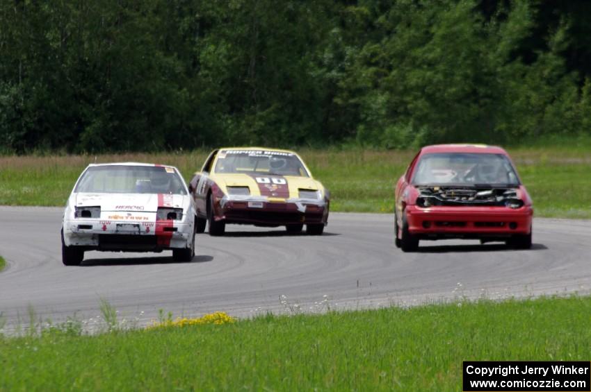 L to R) Team Polska Kielbasa Nissan 280ZX, Gopher Broke Racing Nissan 300ZX and NNM Motorsports Dodge Neon