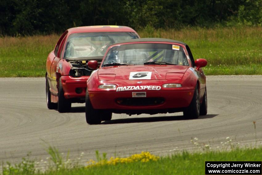 Penalty Lap Racing Mazda Miata and NNM Motorsports Dodge Neon