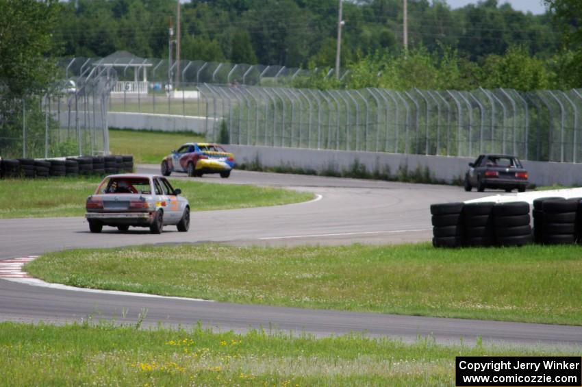 Tubby Butterman BMW 325, Speed Doctors BMW 318i and North Loop Motorsports 2 BMW 325