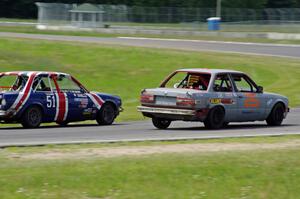 British American Racing BMW 318i goes for an inside pass on the North Loop Motorsports 2 BMW 325