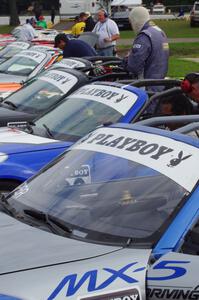 Mazda MX-5s lined up for Saturday morning practice