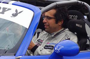 Jason Saini awaits the start of Saturday morning practice in his Mazda MX-5