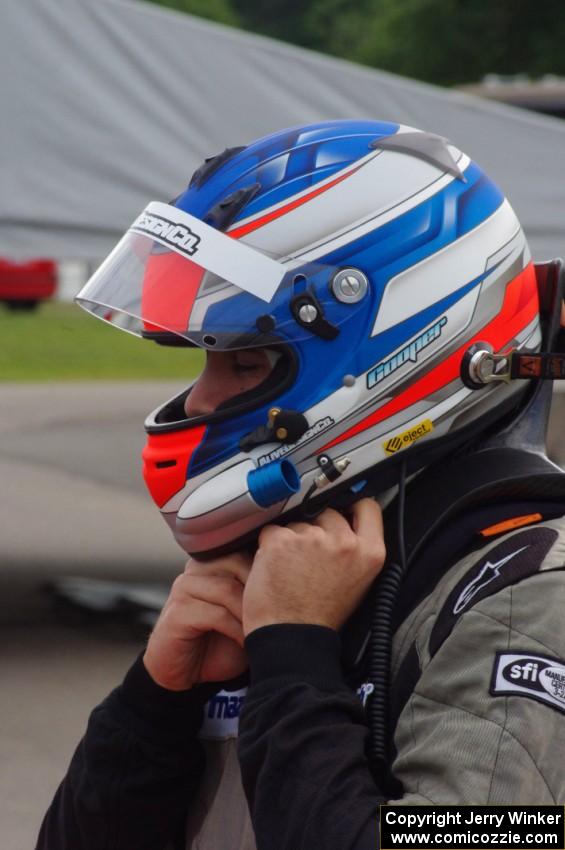 Michael Cooper prepares to hop into his Mazda MX-5