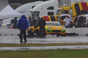 Tim Probert and Ara Malkhassian get rain tires on their Mazda MX-5s