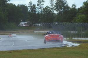 Michael Cooper chases down Dean Copeland's Mazda MX-5