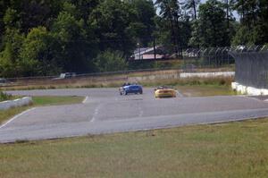 Scott Shelton's and Tim Probert's Mazda MX-5s head into turns 7/8 on the cool-off lap