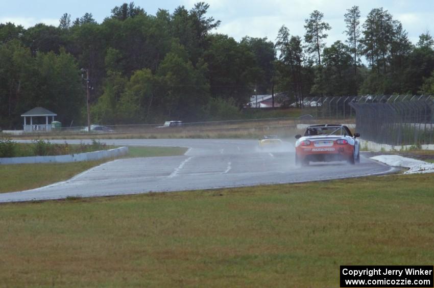 Randy Hale III's Mazda MX-5 goes through turn 6 after the rain has ended