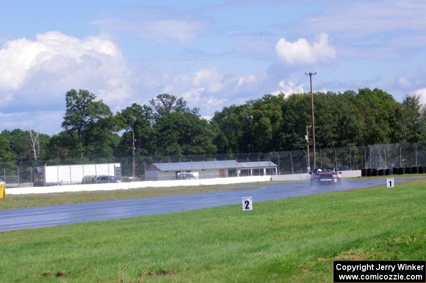 Jeff Mosing's Mazda MX-5 dives into turn 12