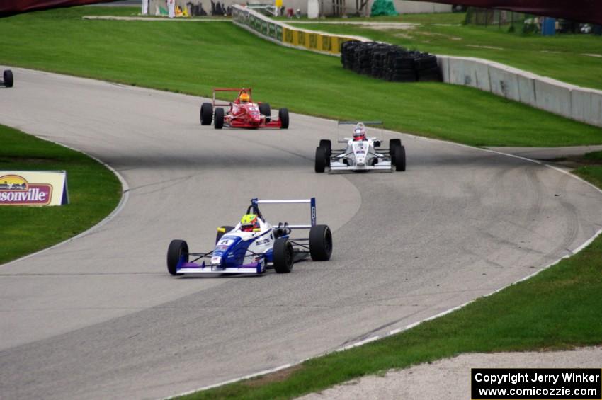 (8) Spencer Pigot leads (3) Petri Suvanto and (4) Wayne Boyd as the rain starts